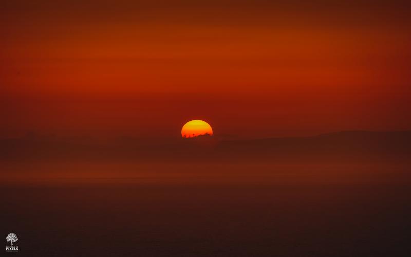 Red sunset over the horizon — © Athanasios Panagiotopoulos